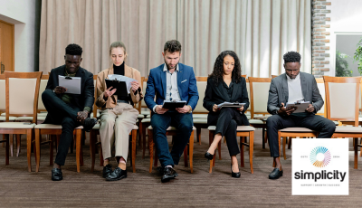 People waiting for interview with Simplicity logo