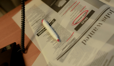 Job ads in newspaper, circled