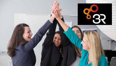 Group of four women high fiving and smiling Group of four women high fiving and smiling